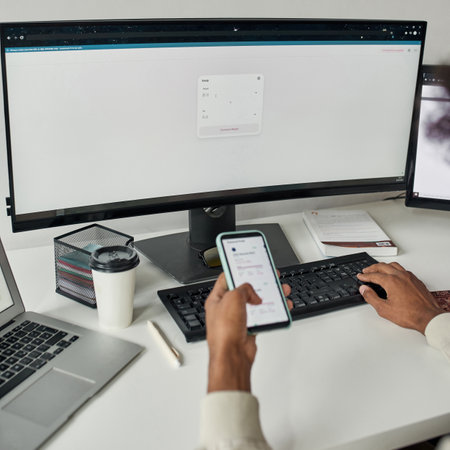 Close up of trader using smarphone for analyzing cryptocurrency exchange rate