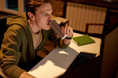 Trader or businessman watching on computer at home