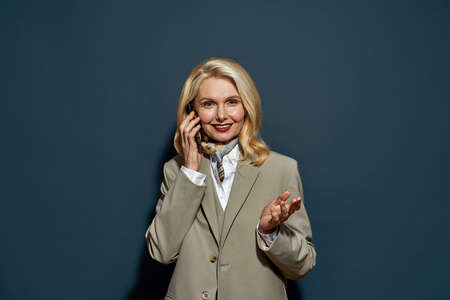 Front view of businesswoman talking on smartphone