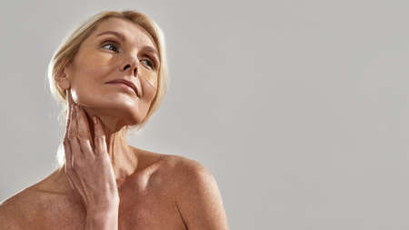 Cropped image of woman with under eye patchesの写真素材