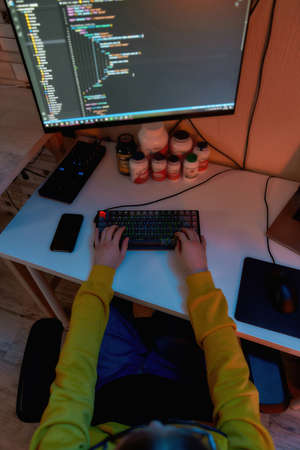 IT developer type and program script on computerの写真素材