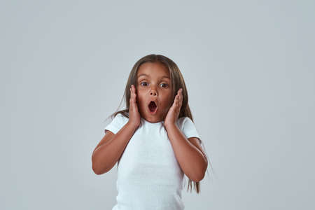 Cropped image of scared girl with open mouth