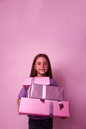 Front view of caucasian girl with gift boxesの写真素材