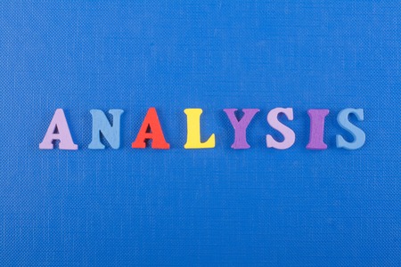 ANALYSIS word on blue background composed from colorful abc alphabet block wooden letters, copy space for ad text. Learning english concept.の写真素材