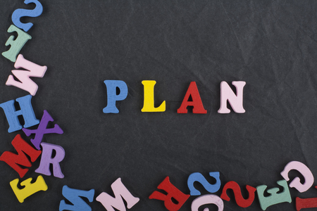 word on black board background composed from colorful abc alphabet block wooden letters, copy space for ad text. Learning english conceptの写真素材