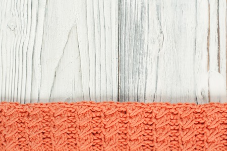 Sweater or scarf fabric texture large knitting. Knitted jersey background with a relief pattern. Braids in knitting . Wool hand- machine, handmadeの写真素材