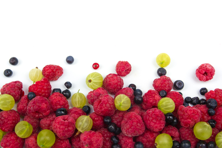 Various fresh summer berries on a white background. Top viewの写真素材
