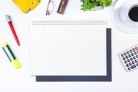 White Office desk table with computer, pen and a cup of coffee, lot of things. Top view with copy space.の写真素材