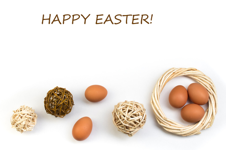 Happy Easter. eggs isolated on white background. Balls, wreath woven from the vines.の写真素材