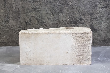 bricks on the gray concrete background. Copy space. Top view.の写真素材