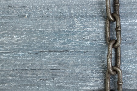 wooden background with chain. Copy space for text.の写真素材