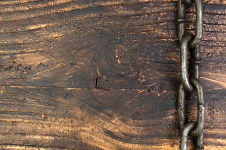 wooden background with chain. Copy space for text.の写真素材