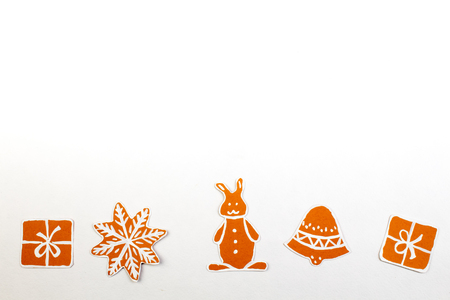 Gingerbread cookies over white background. Top view with.の写真素材