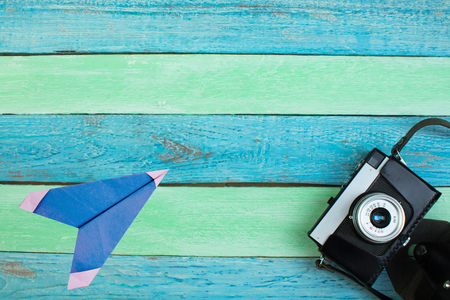 camera on Wooden Background - Beach Summer Holiday. Top view and copy space.の写真素材