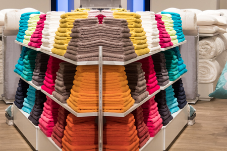 Abstract blurred image of shopping mall or retail store with product shelves. shopping center showcase.の写真素材