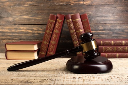 Law and Justice, Legality concept, Judge Gavel on a wooden background, Law library concept.の写真素材