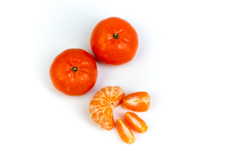 Ripe orange fresh mandarin , clean mandarin, mandarin slices, isolated on white background.Top viewの写真素材