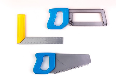 Toy. professional repairing implements for decorating and building renovation set on the on white background. Electrical tools. Top view. Copy space for text.の写真素材