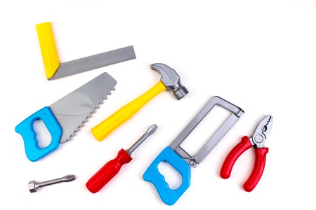 Toy. professional repairing implements for decorating and building renovation set on the on white background. Electrical tools. Top view. Copy space for text.の写真素材