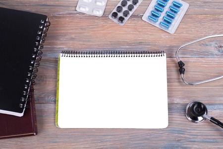 Health care template for text medicine treatment concept. Empty blank, stethoscope, prescription medical help emergency, healthy ambulance technology on wooden table.の写真素材