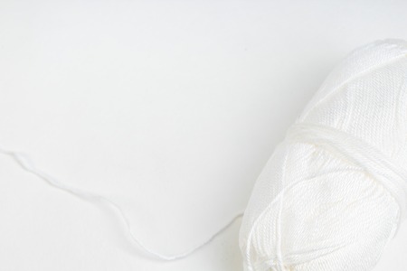 Sweater or scarf fabric texture large knitting. Knitted jersey background with a relief pattern. Wool hand- machine, handmadeの写真素材