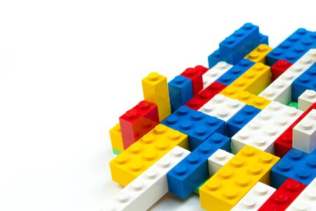 Lot of colorful rainbow toy bricks . Educational toy for children Isolated on white background. 3D Rendering. Top view with copy spaceの写真素材