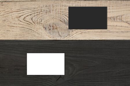 Blank business cards on the wooden table. Template for ID. Top view.の写真素材