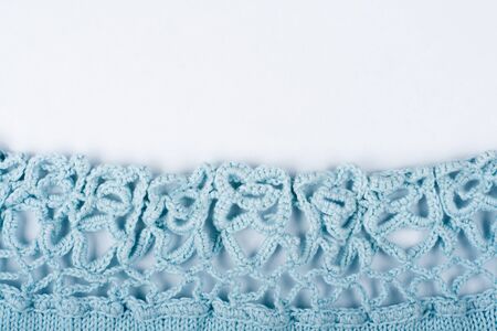Sweater or scarf fabric texture large knitting. Knitted jersey background with a relief pattern. Wool hand- machine, handmade. Crochetingの写真素材