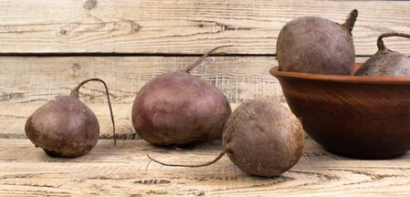 Organic vegan food. potato on wooden background. country style.の写真素材
