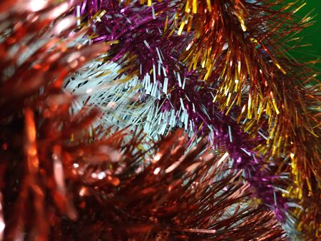 Colorful tinsel , Christmas decorations holiday backgroundの写真素材