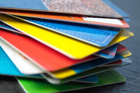 Stack of bank cards on a black background