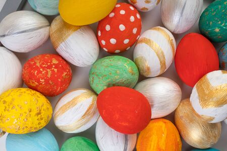 Happy Easter card. Colorful shiny eggs background. Copy space for text.