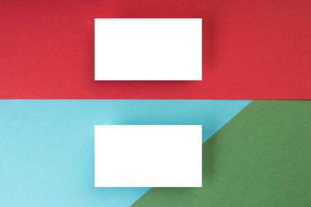 Business card blank over colorful abstract background. Corporate stationery branding mock-up. Copy...