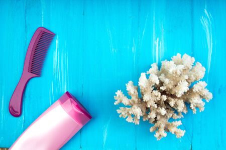 Pink flip flops, corals, slave, sunscreen, starfish ,summer background. Top view.の写真素材