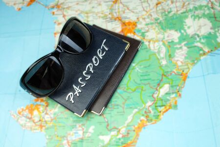 Two passports on the world map. The concept of tourism. Top view .の写真素材