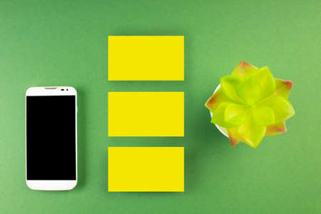 Business card blank over colorful background. Copy space for text. Top view.Business card blank over colorful abstract background. Corporate stationery branding mock-up. Copy space for text. Top view.の写真素材