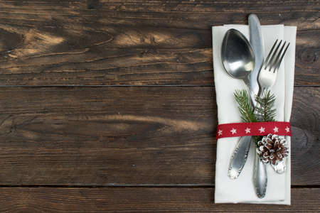Christmas table place setting. Holidays background. Top view with copy space.の写真素材
