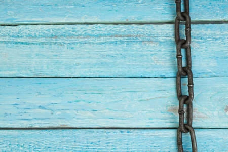 wooden background with chain. Copy space for text.の写真素材