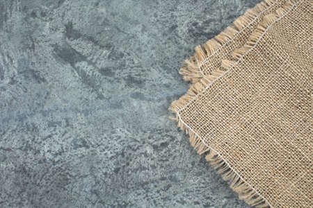 Linen napkin on light gray concrete background. Table setting for menu, layout, place for text , recipe background Top view with copy space,の写真素材