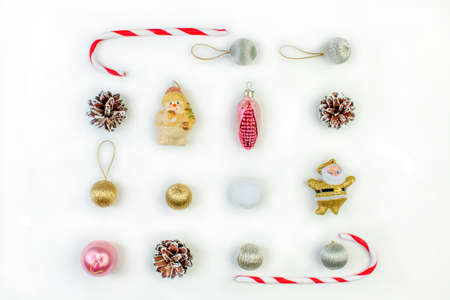 Christmas composition. Gift, christmas decoration, pine cones. Flat lay, top view.の写真素材