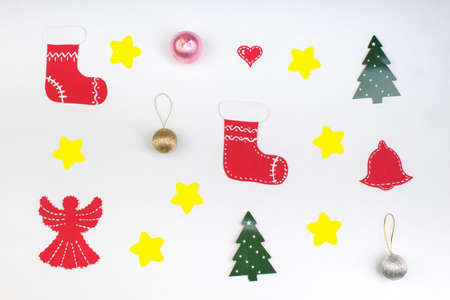 Christmas composition of fir branches and Christmas balls of viburnum on a white background isolated.の写真素材