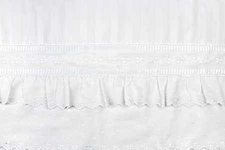 background of white embroidered fabrics, decorative lace.の写真素材