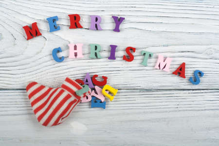 MERRY CHRISTMAS word on wooden background composed from colorful abc alphabet block wooden letters, copy space for ad text. Learning english concept.の写真素材