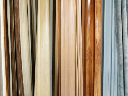 Artistic wooden background from different types of wood. Copy space for text.の写真素材