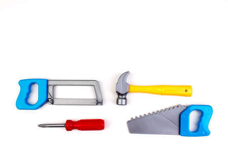 Toy. professional repairing implements for decorating and building renovation set on the on white background. Electrical tools. Top view. Copy space for text.の写真素材