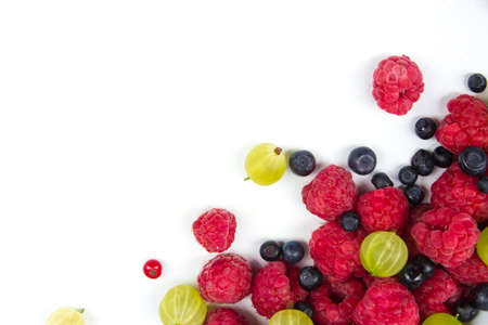 Various fresh summer berries on a white background. Top viewの写真素材