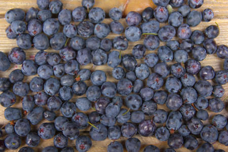 Blueberry on wooden table background, bowl of blueberries. .Antioxidants, detox diet, organic fruits. Berriesの写真素材
