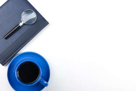 White Office desk table with computer, pen and a cup of coffee, lot of things. Top view with copy space.の写真素材