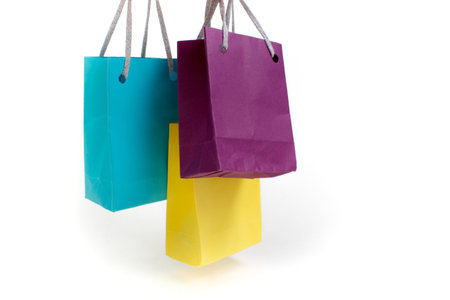Paper shopping bags with handles on white background. Mockup for design. black Fridayの写真素材