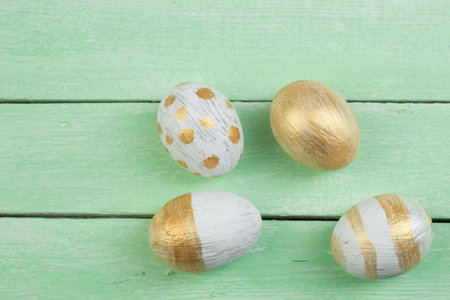 Happy Easter. Painted eggs on wooden table. top view. Copy space for textの写真素材
